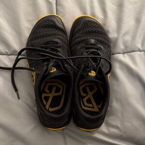 Born Primitive Women’s Don’t tread on Me Black and Yellow Athletic Sneakers